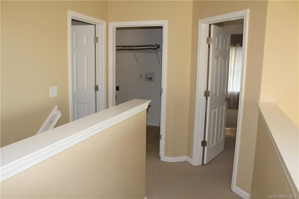 164 Wildbriar Road Fletcher, NC 28732 - Photo 10 of 16 a view of a hallway with closet and door