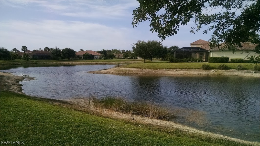 4629 Fairloop Run Lehigh Acres, FL 33973 - Photo 15 of 24 a view of lake with green space