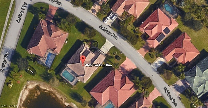 4629 Fairloop Run Lehigh Acres, FL 33973 - Photo 16 of 24 an aerial view of a house