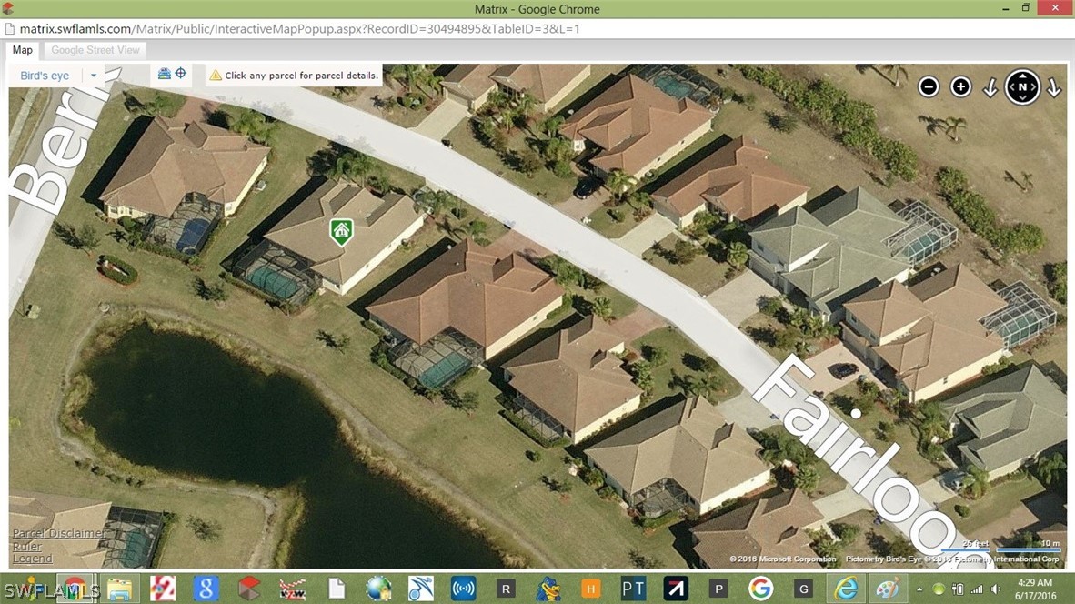 4629 Fairloop Run Lehigh Acres, FL 33973 - Photo 17 of 24 an aerial view of a house with a outdoor space
