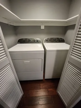 a utility room with dryer and washer