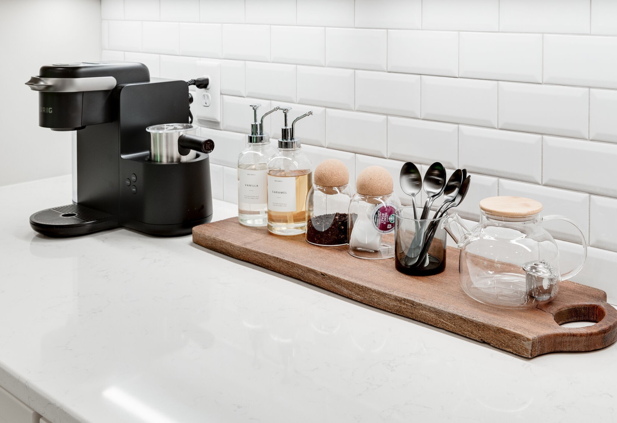545 Delacy Drive Fairview, TN 37062 - Photo 14 of 40 a kitchen with a sink and a stove with white cabinets