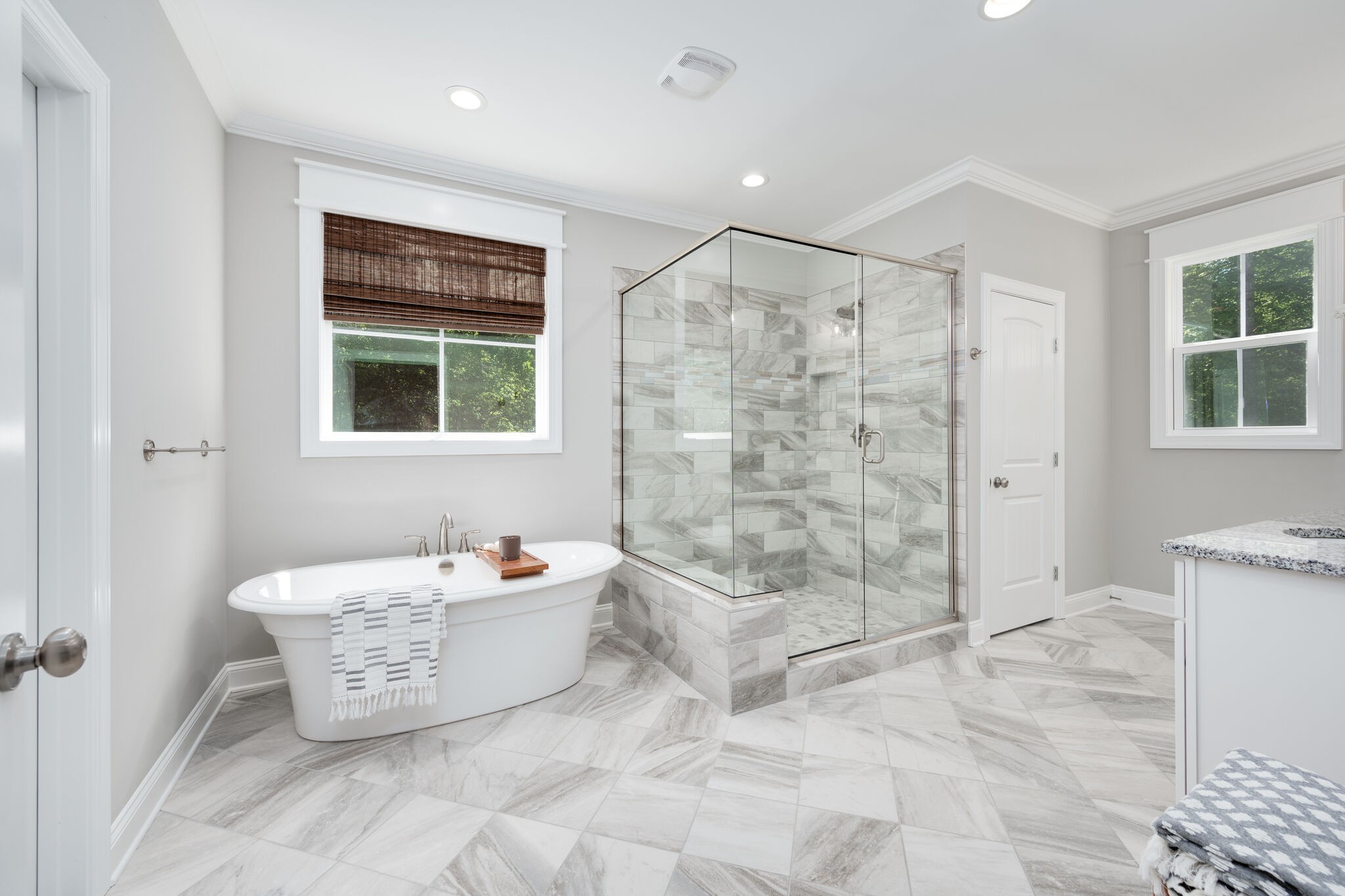 545 Delacy Drive Fairview, TN 37062 - Photo 23 of 40 a bathroom with a bathtub and shower