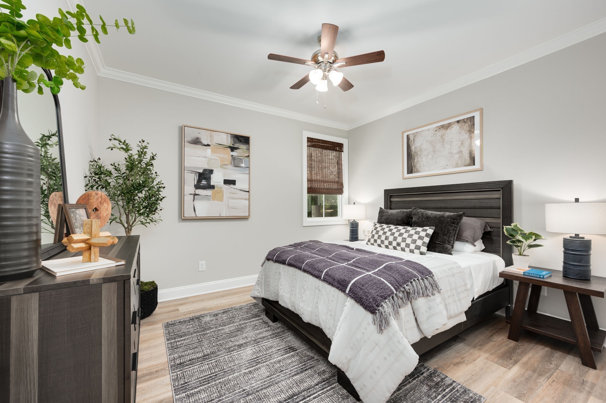 545 Delacy Drive Fairview, TN 37062 - Photo 31 of 40 a bedroom with a bed and a chandelier