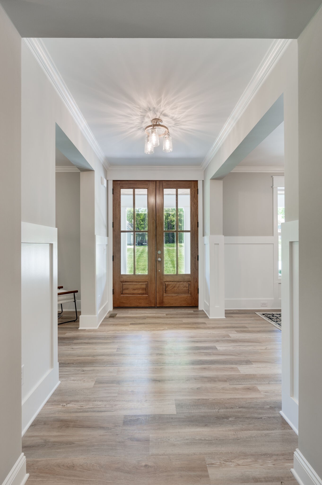 545 Delacy Drive Fairview, TN 37062 - Photo 5 of 40 a view of an empty room with wooden floor and a window