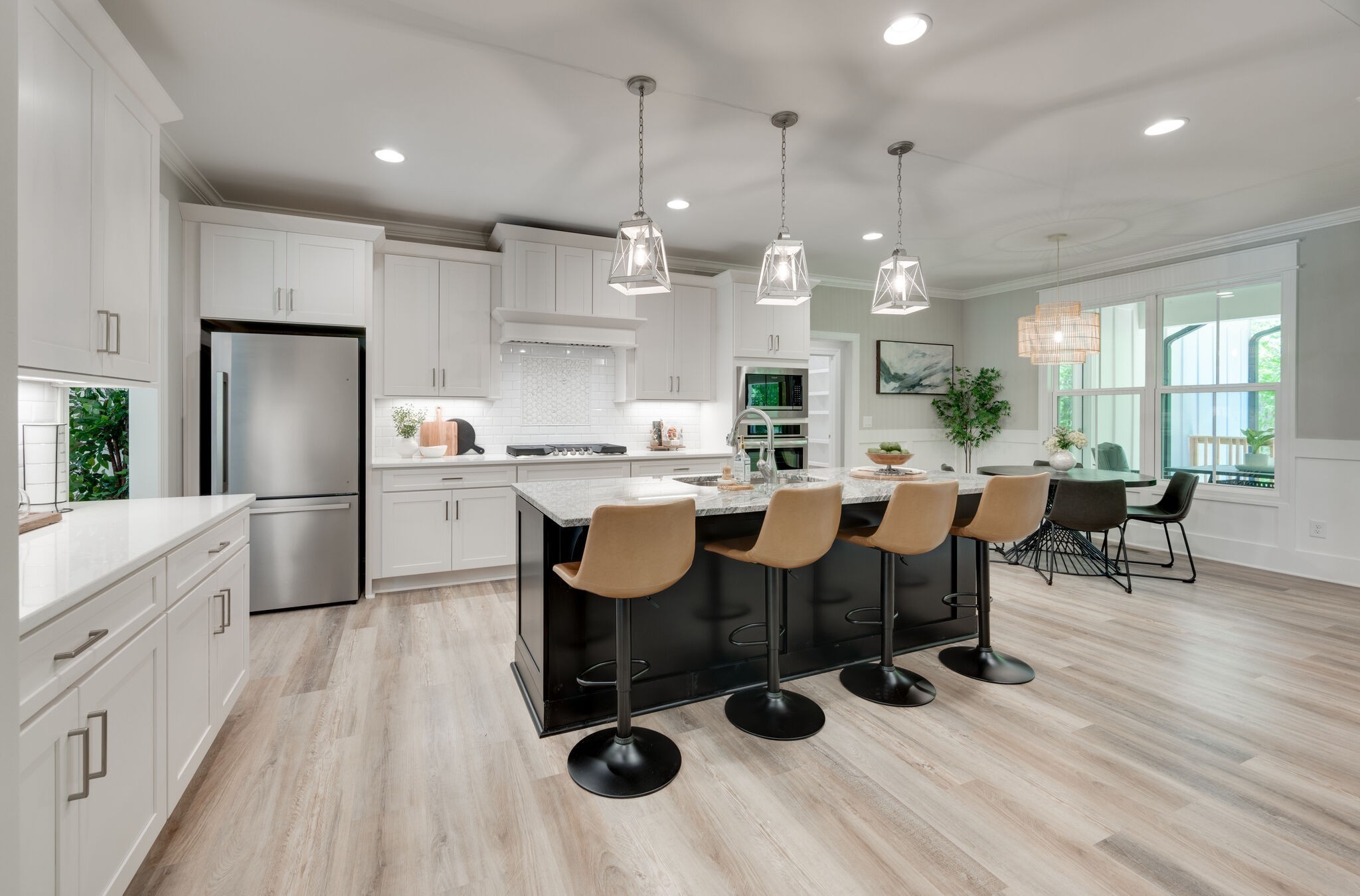 545 Delacy Drive Fairview, TN 37062 - Photo 8 of 40 a large kitchen with a table and chairs