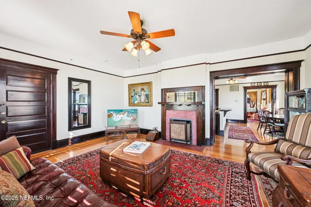 a bedroom with a bed and large window
