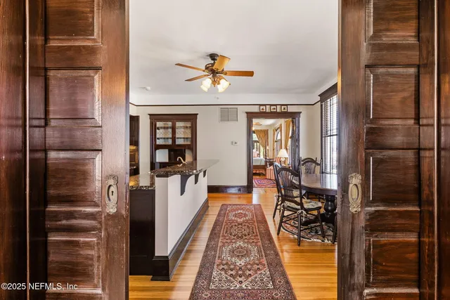 a bathroom with a sink vanity and a mirror
