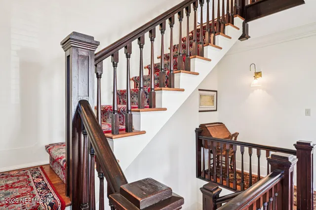 a view of a livingroom with furniture and front door