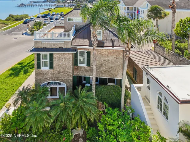 a living room with furniture rug and window
