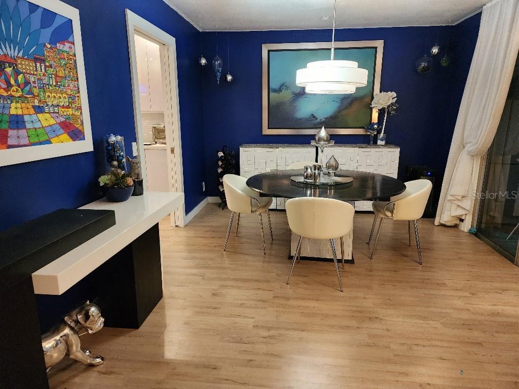 610 Chestnut Oak Circle, Unit 110 Altamonte Springs, FL 32701 - Photo 4 of 15 a living room with furniture a piano and a flat screen tv