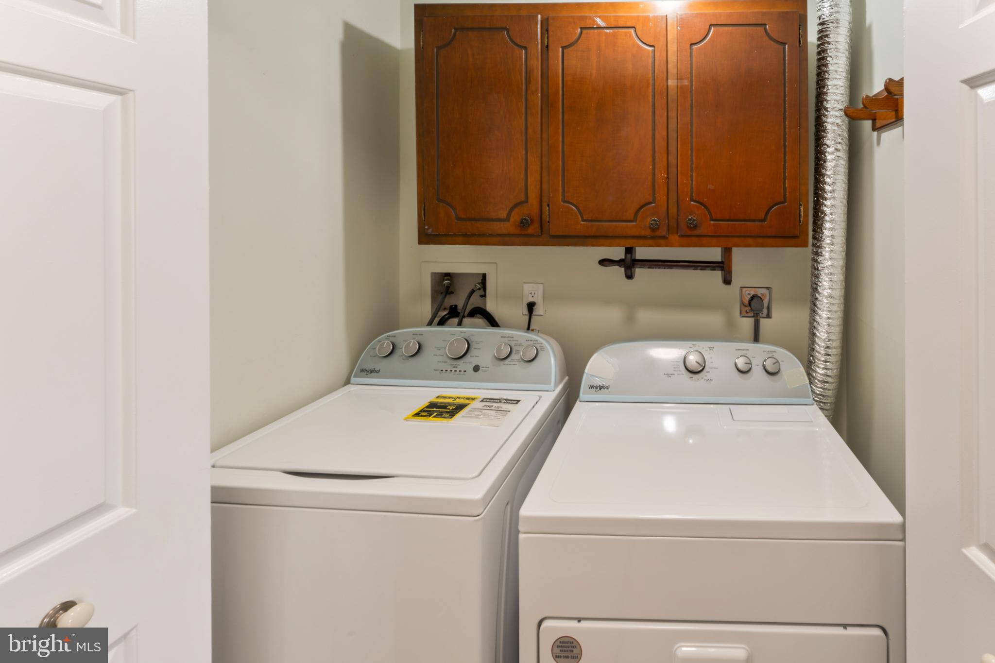 8213 Roxbury Drive Alexandria, VA 22309 - Photo 11 of 32 a utility room with dryer and washer