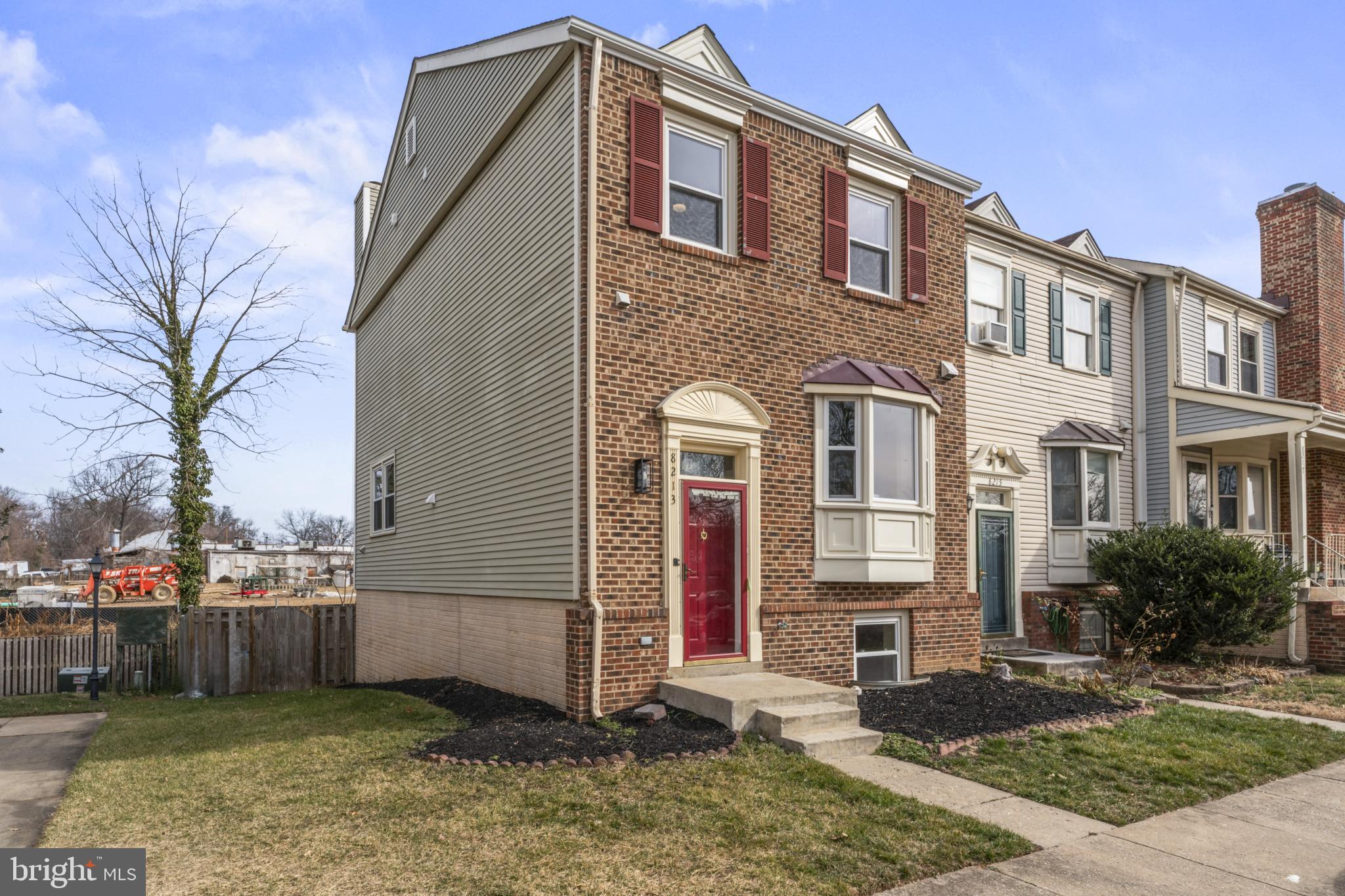 8213 Roxbury Drive Alexandria, VA 22309 - Photo 2 of 32 a front view of a house with a yard