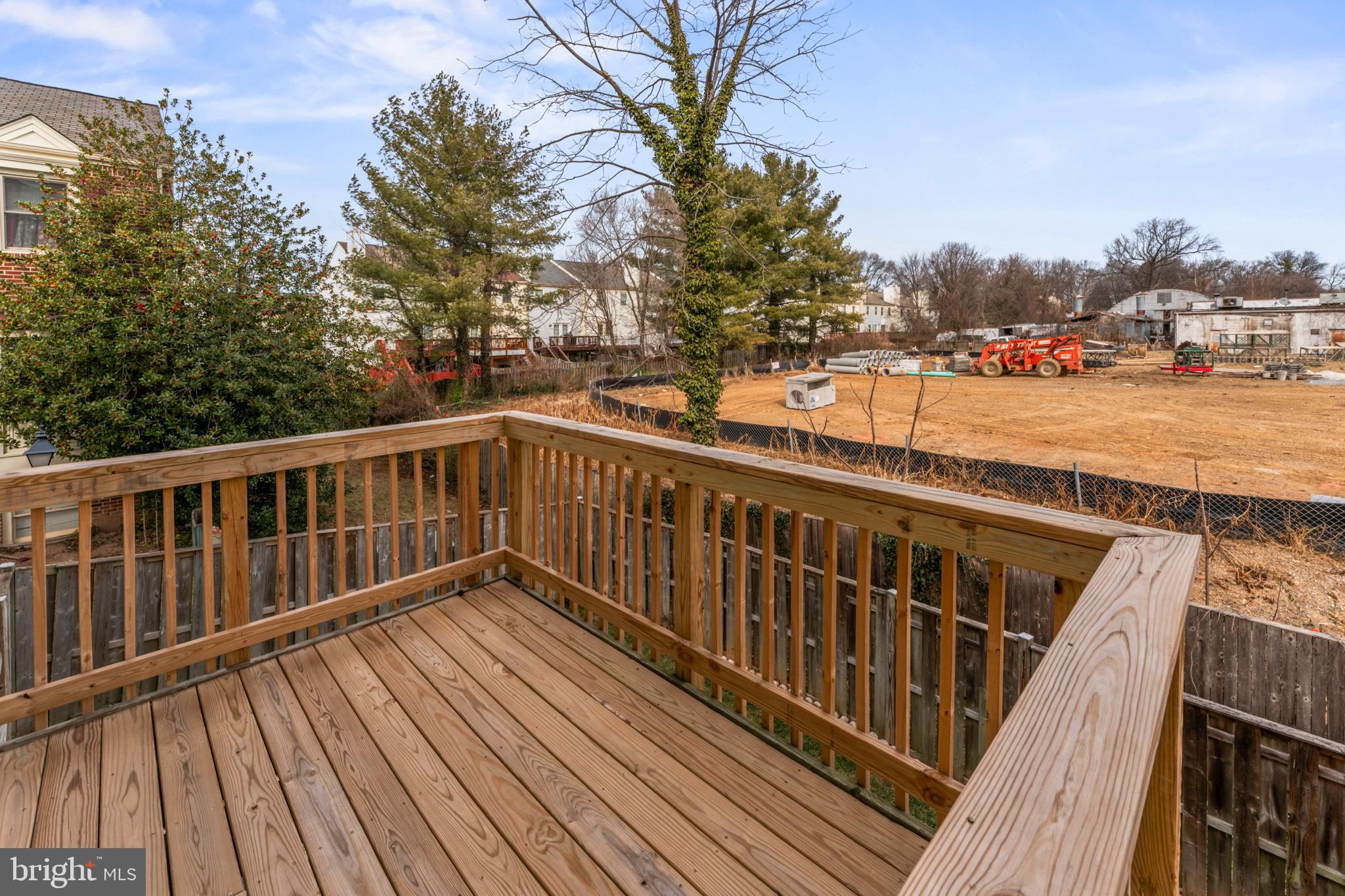 8213 Roxbury Drive Alexandria, VA 22309 - Photo 21 of 32 a view of balcony with wooden floor and fence and trees