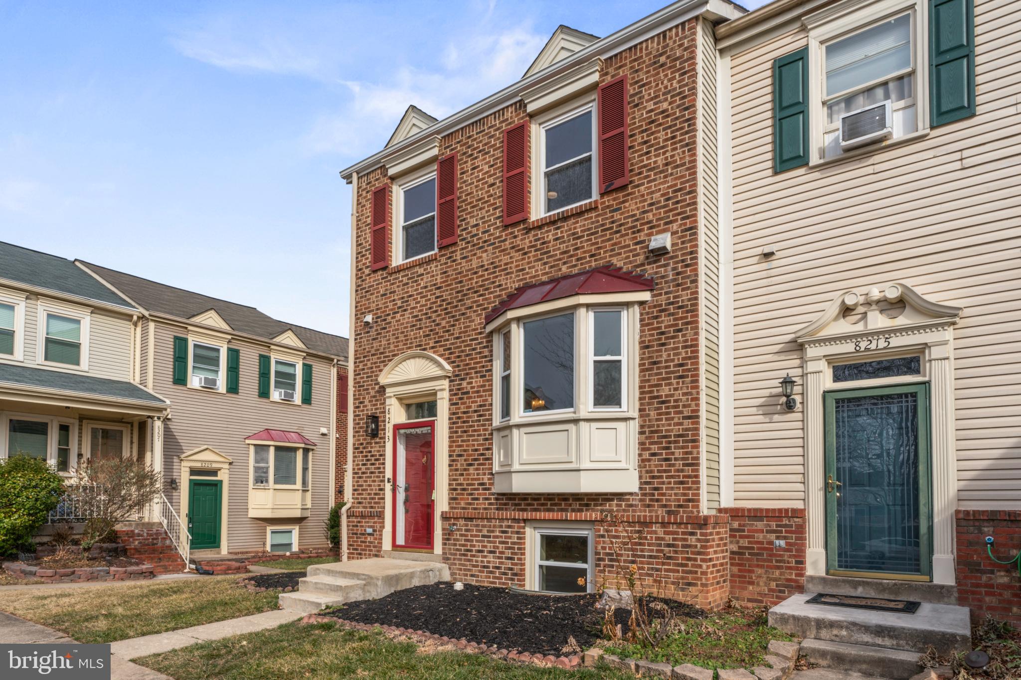 8213 Roxbury Drive Alexandria, VA 22309 - Photo 3 of 32 a front view of a house with a yard