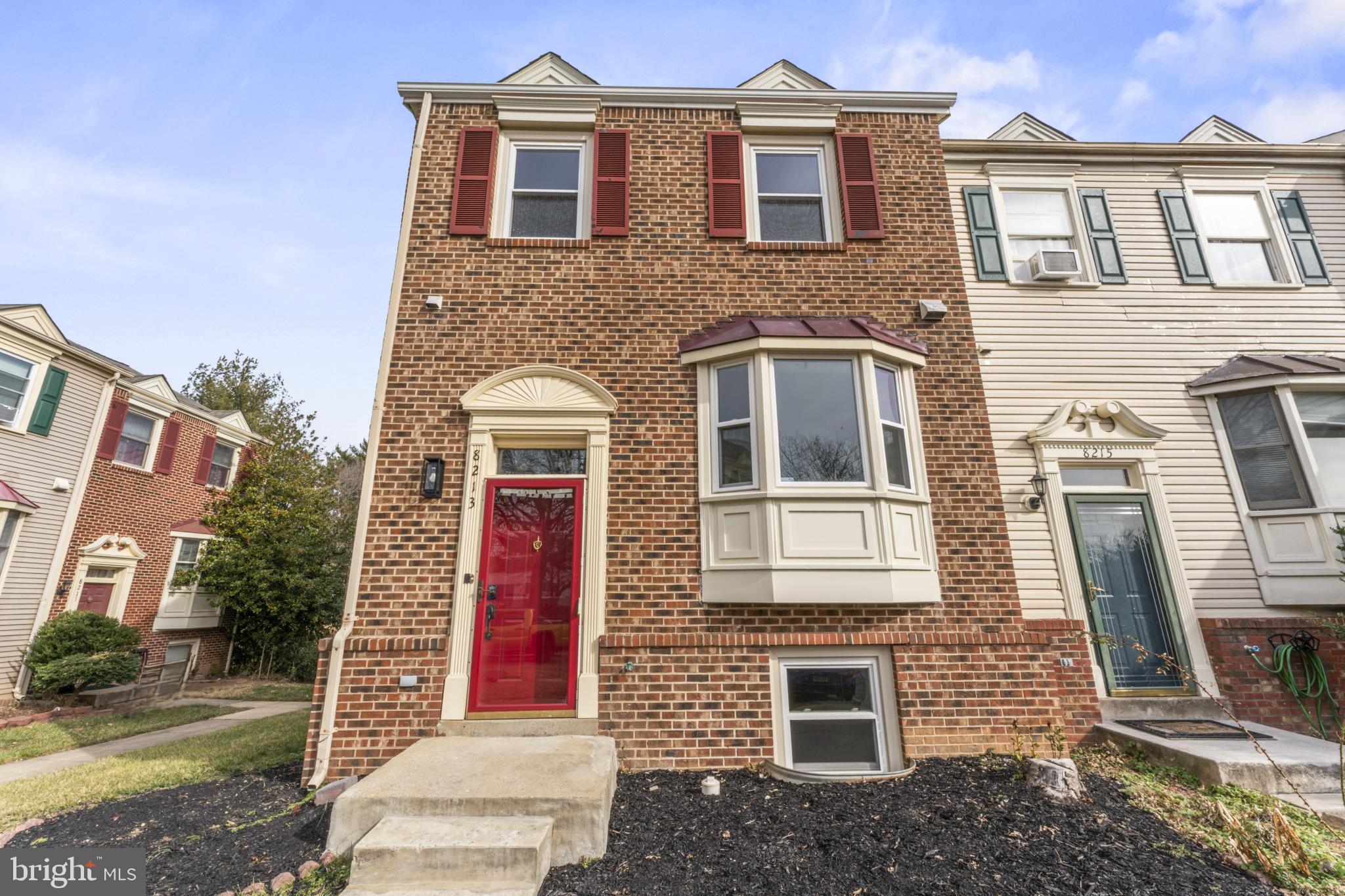 8213 Roxbury Drive Alexandria, VA 22309 - Photo 4 of 32 a front view of a house with a yard
