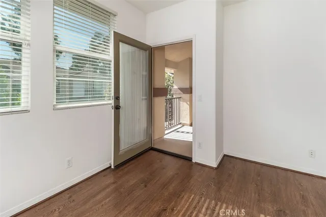 a bathroom with a double vanity sink mirror and shower