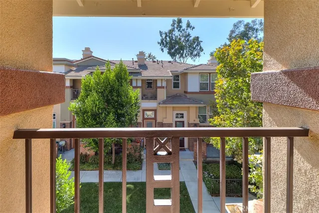a bathroom with a shower a toilet and a sink