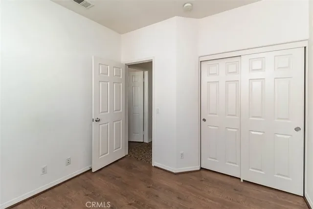 a view of a backyard with swimming pool