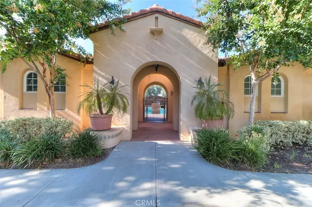 a childrens park with lots of swings and slides and yard