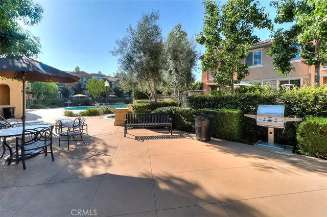 a view of a building with sitting area
