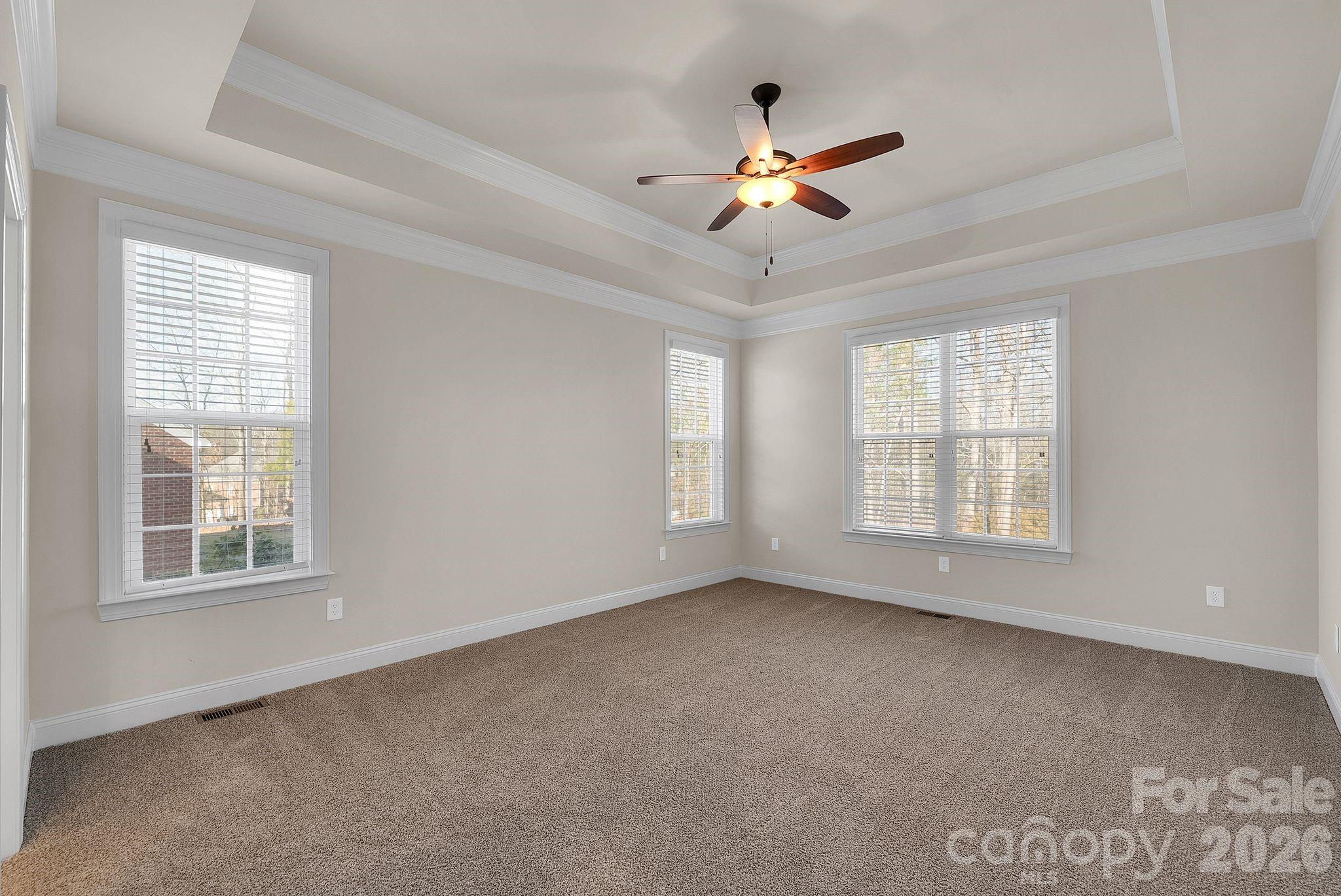 535 Brightleaf Place Northwest Concord, NC 28027 - Photo 18 of 48 a view of an empty room with a window