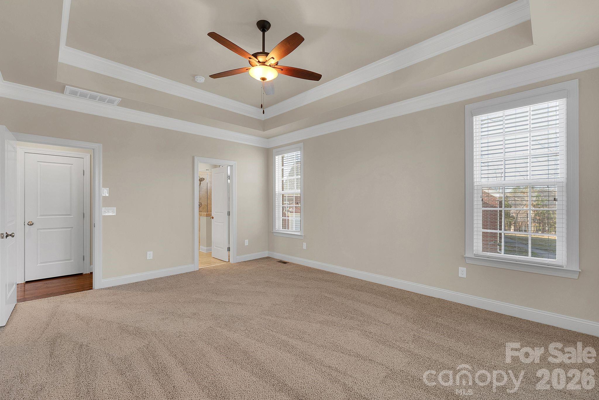535 Brightleaf Place Northwest Concord, NC 28027 - Photo 20 of 48 a view of an empty room with a window
