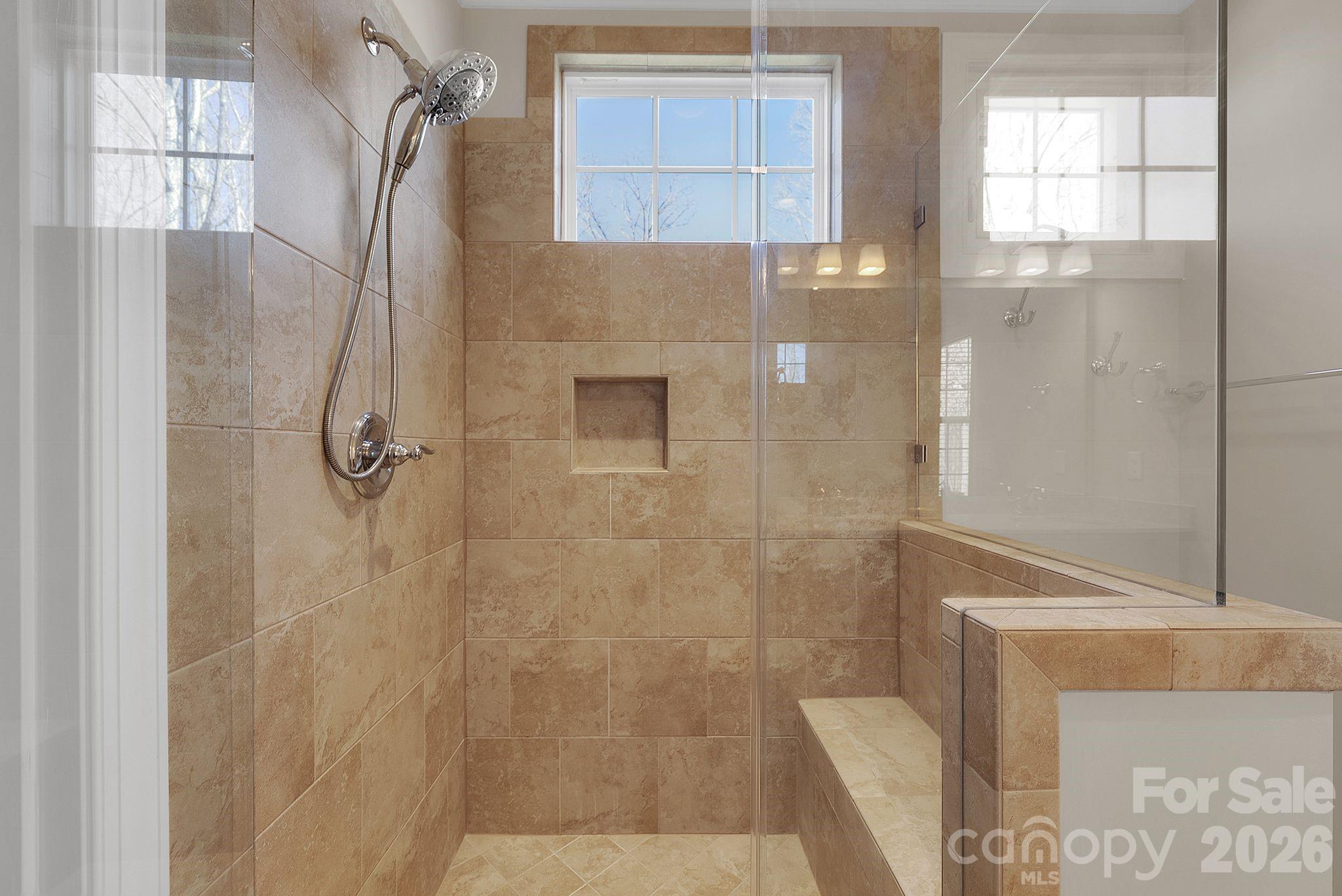 535 Brightleaf Place Northwest Concord, NC 28027 - Photo 23 of 48 a bathroom with a shower