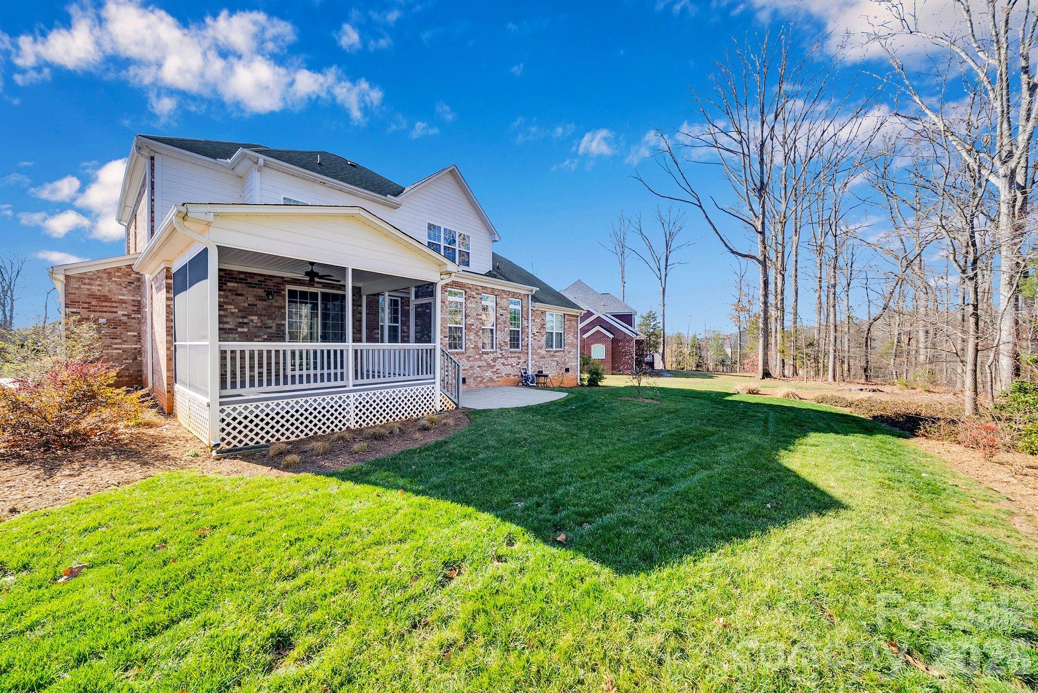 535 Brightleaf Place Northwest Concord, NC 28027 - Photo 36 of 48 a view of a house with a yard