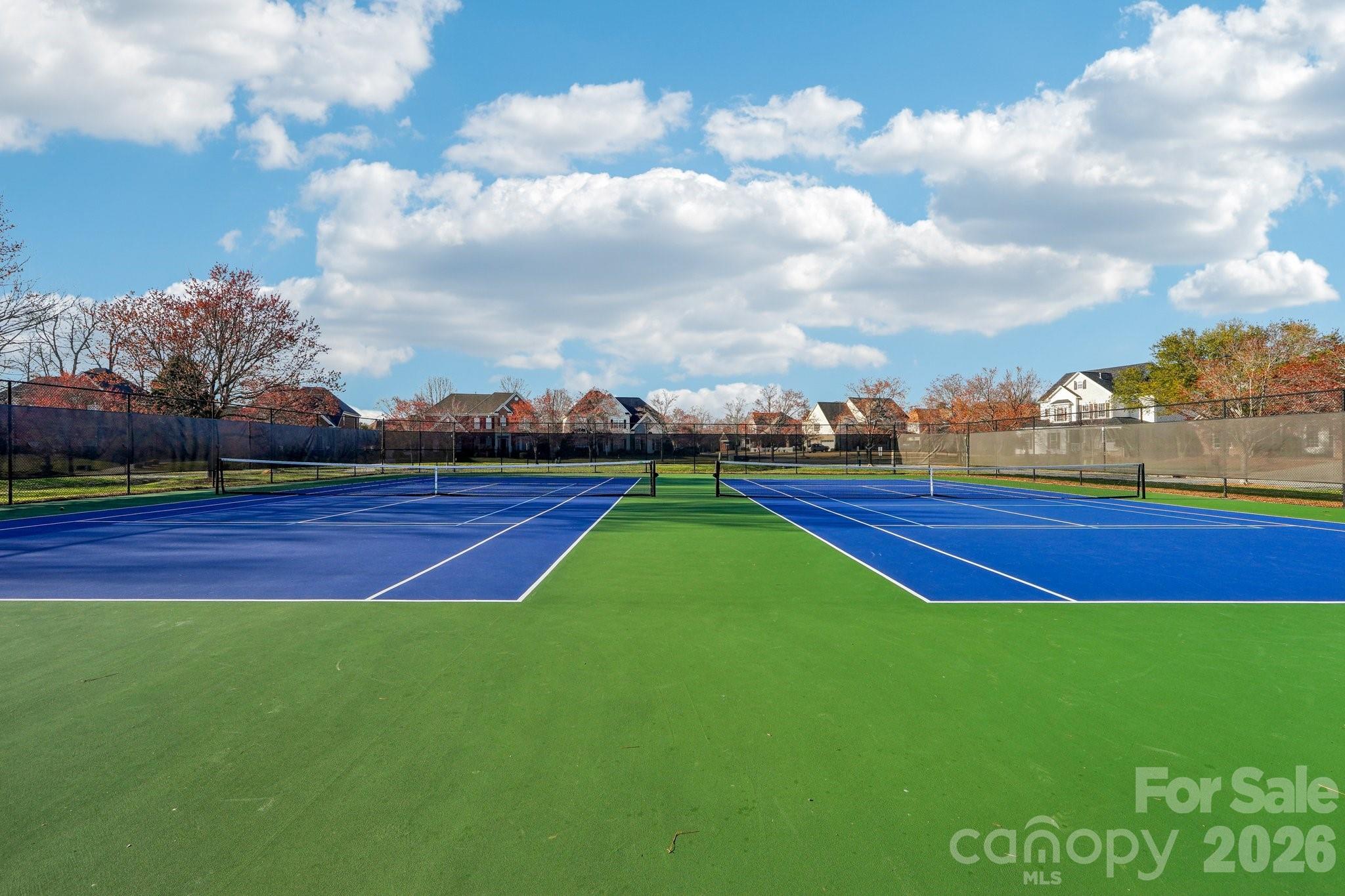 535 Brightleaf Place Northwest Concord, NC 28027 - Photo 46 of 48 a view of green field with house in the background