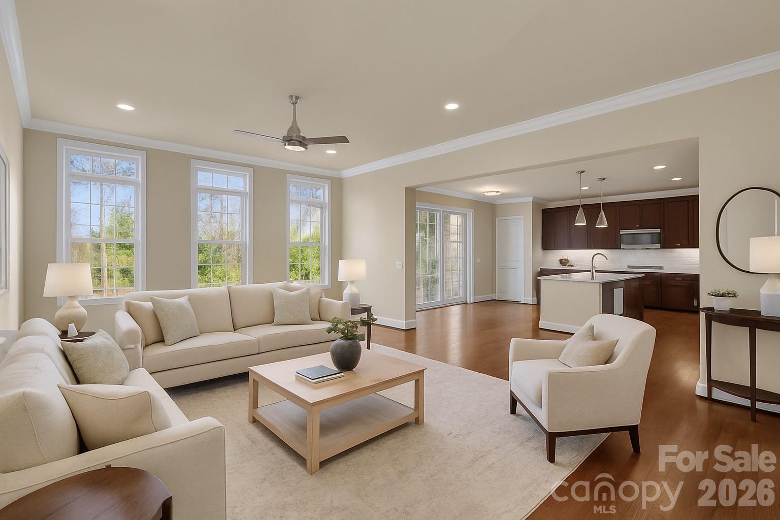 535 Brightleaf Place Northwest Concord, NC 28027 - Photo 9 of 48 a living room with furniture and a large window