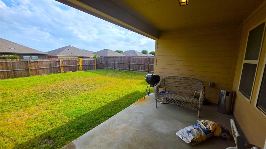 409 Samuel Street Denton, TX 76207 - Photo 34 of 40 a view of a swimming pool with a lounge chairs