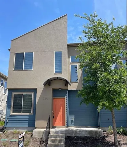 a house view with a outdoor space