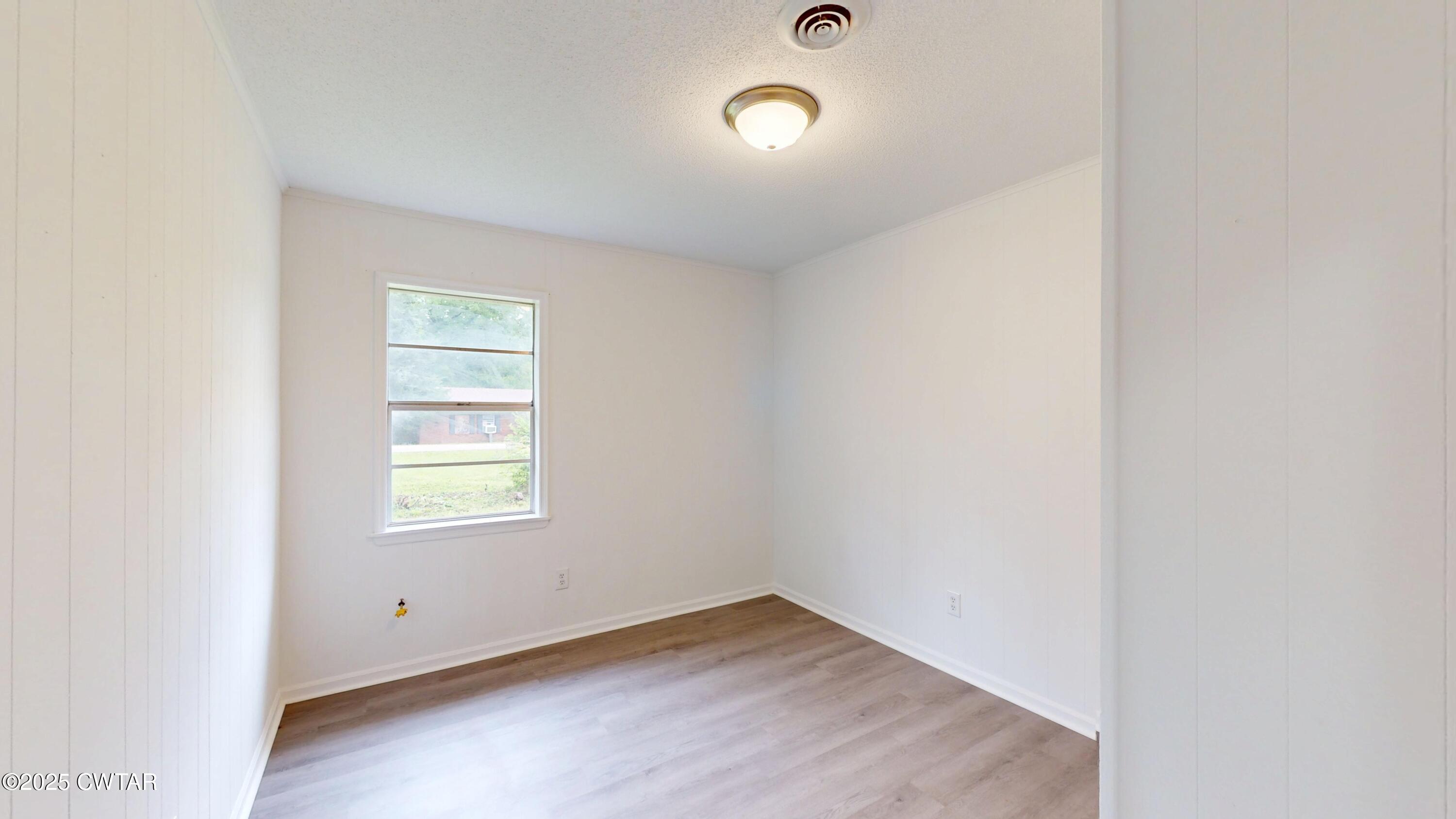 245 Smithville Road Ripley, TN 38063 - Photo 20 of 34 an empty room with a window