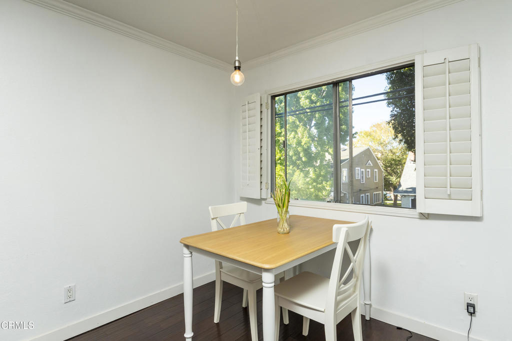 355 South Madison Avenue, Unit 212 Pasadena, CA 91101 - Photo 17 of 27 a view of a dining room with furniture and a window