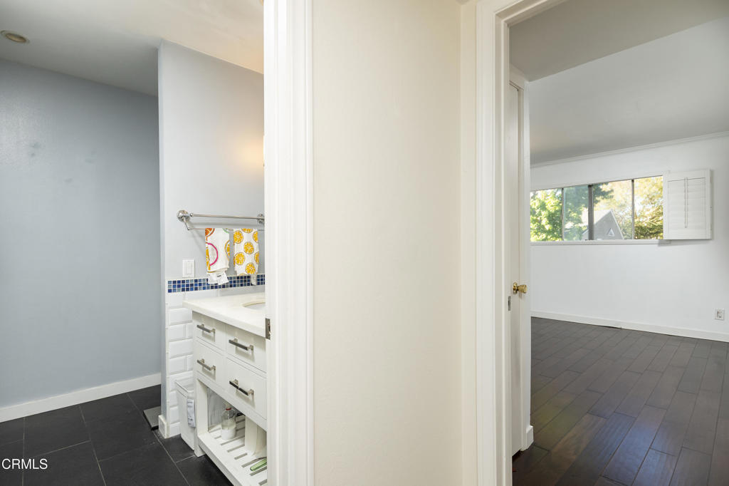 355 South Madison Avenue, Unit 212 Pasadena, CA 91101 - Photo 18 of 27 an empty room with window and wooden floor
