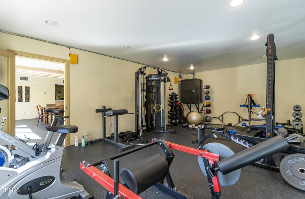 355 South Madison Avenue, Unit 212 Pasadena, CA 91101 - Photo 21 of 27 a room with gym equipment