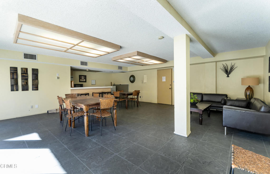 355 South Madison Avenue, Unit 212 Pasadena, CA 91101 - Photo 23 of 27 a view of a livingroom with furniture and a window