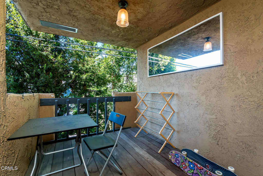 355 South Madison Avenue, Unit 212 Pasadena, CA 91101 - Photo 27 of 27 a view of a chairs and table in the balcony