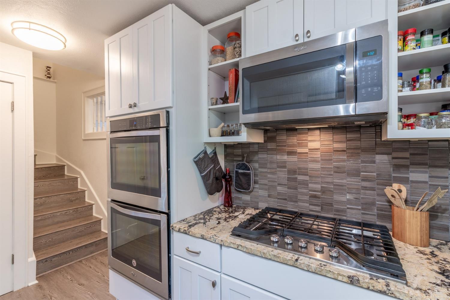 660 Level Lane Springfield, OR 97477 - Photo 23 of 23 a kitchen with a stove and a microwave