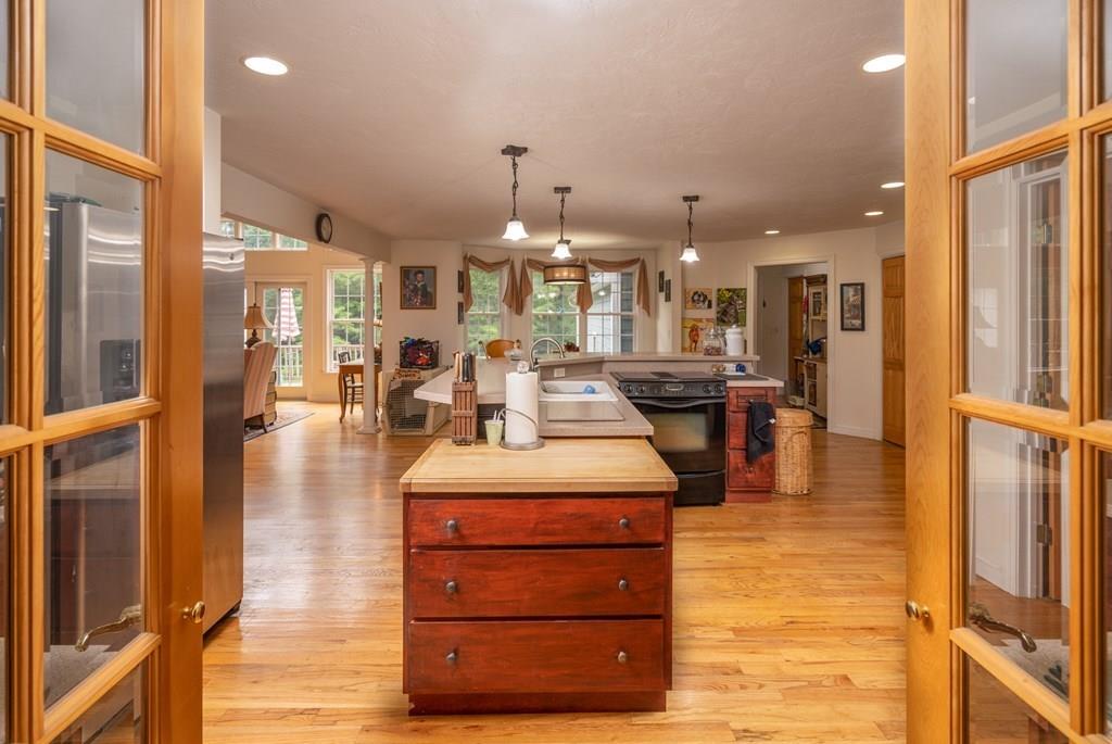 70 Allen Hill Road Holland, MA 01521 - Photo 3 of 36 a room with lots of counter space and furniture