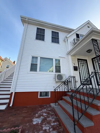 a front view of a house with balcony