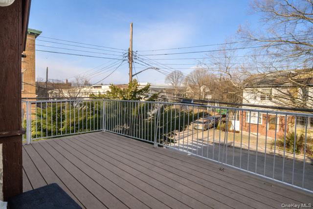 88-02 88th Street Queens, NY 11421 - Photo 14 of 16 a view of a balcony with lake view
