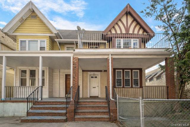 88-02 88th Street Queens, NY 11421 - Photo 2 of 16 a front view of a house