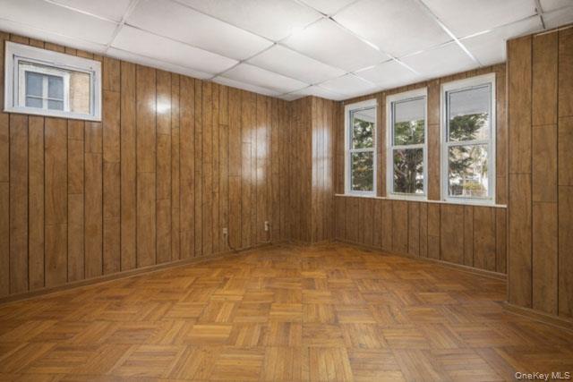 88-02 88th Street Queens, NY 11421 - Photo 8 of 16 a view of an empty room with a window