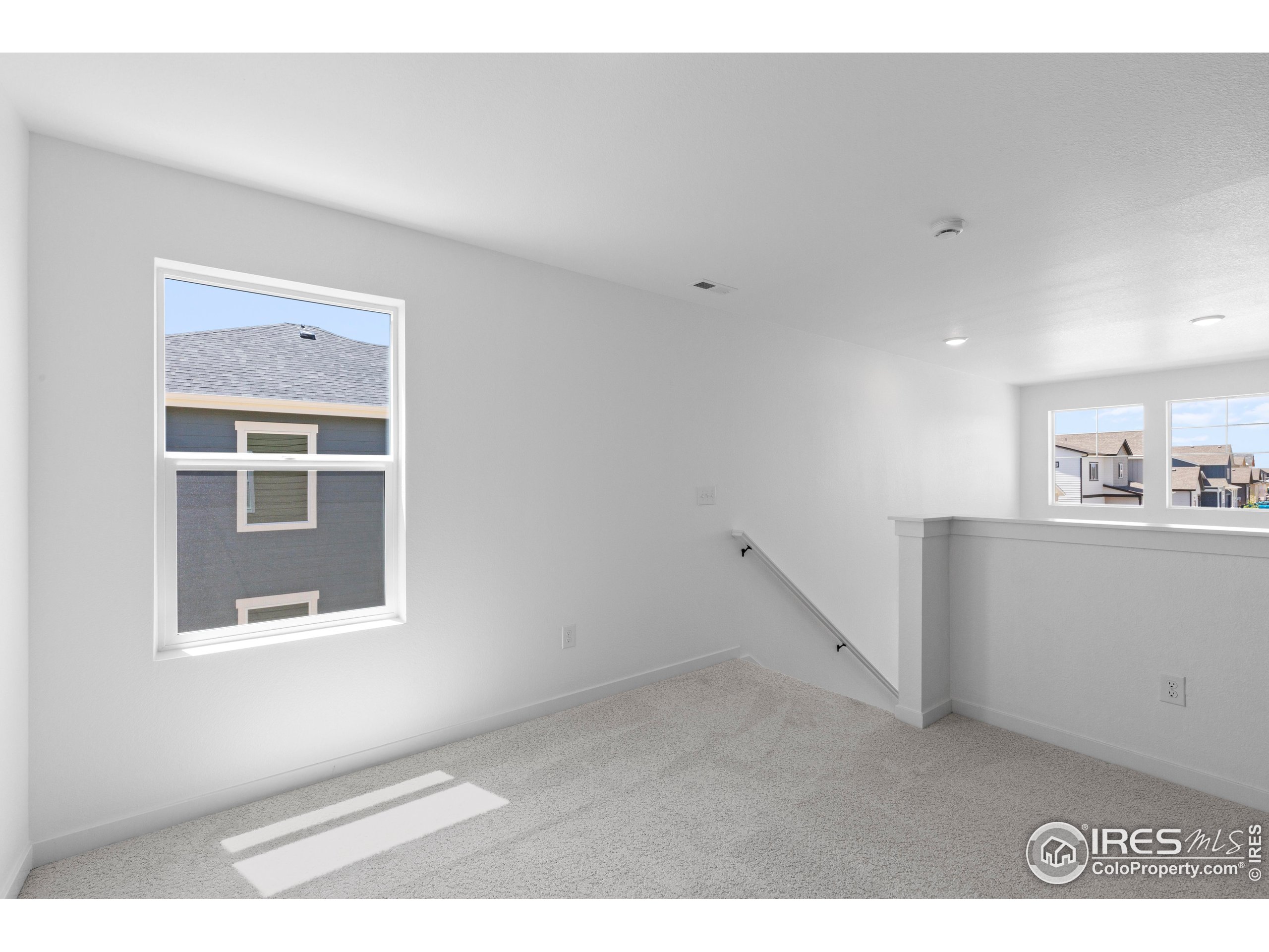 737 Muturu Road Johnstown, CO 80534 - Photo 18 of 26 a view of an empty room with a window