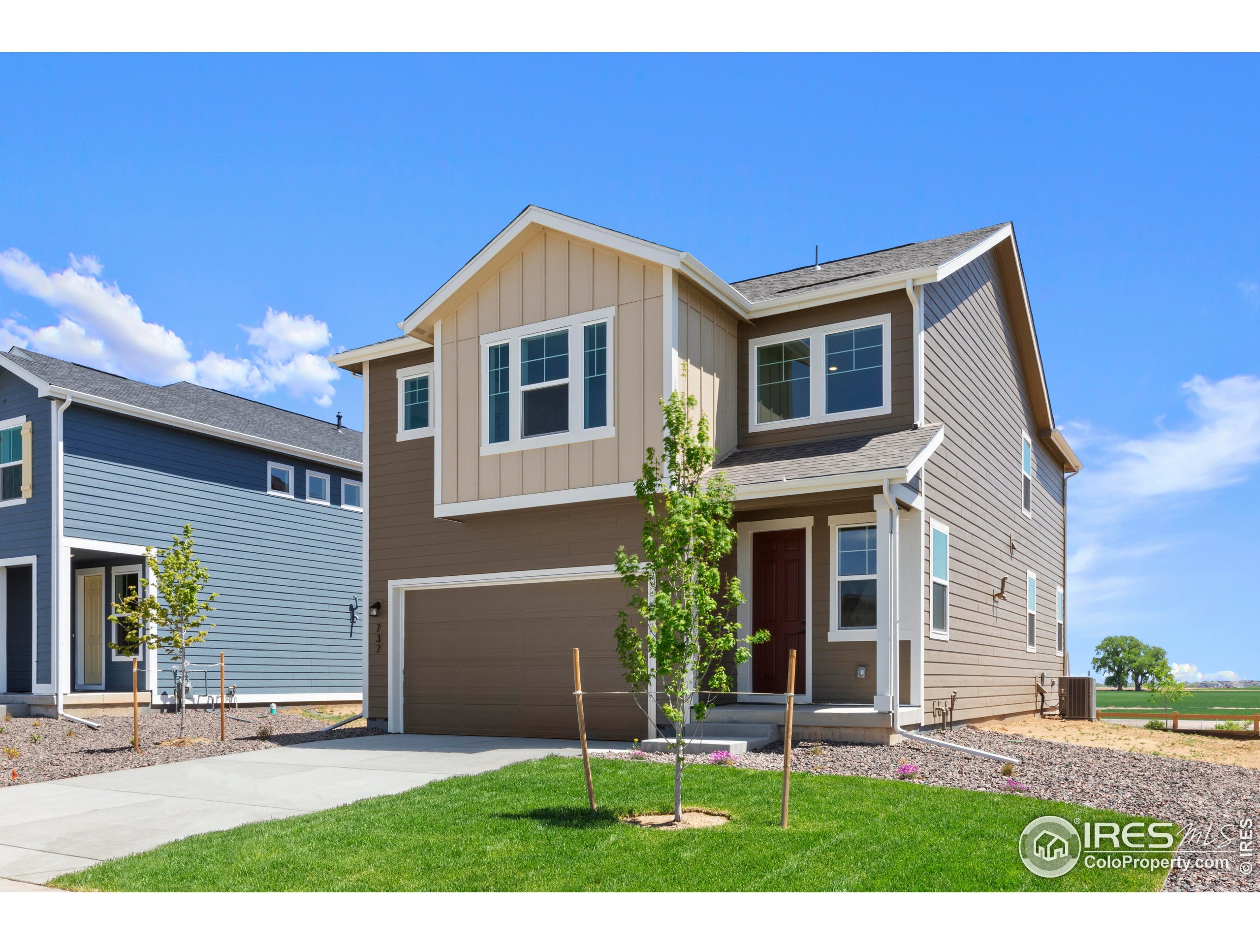 737 Muturu Road Johnstown, CO 80534 - Photo 2 of 26 a house view with a outdoor space