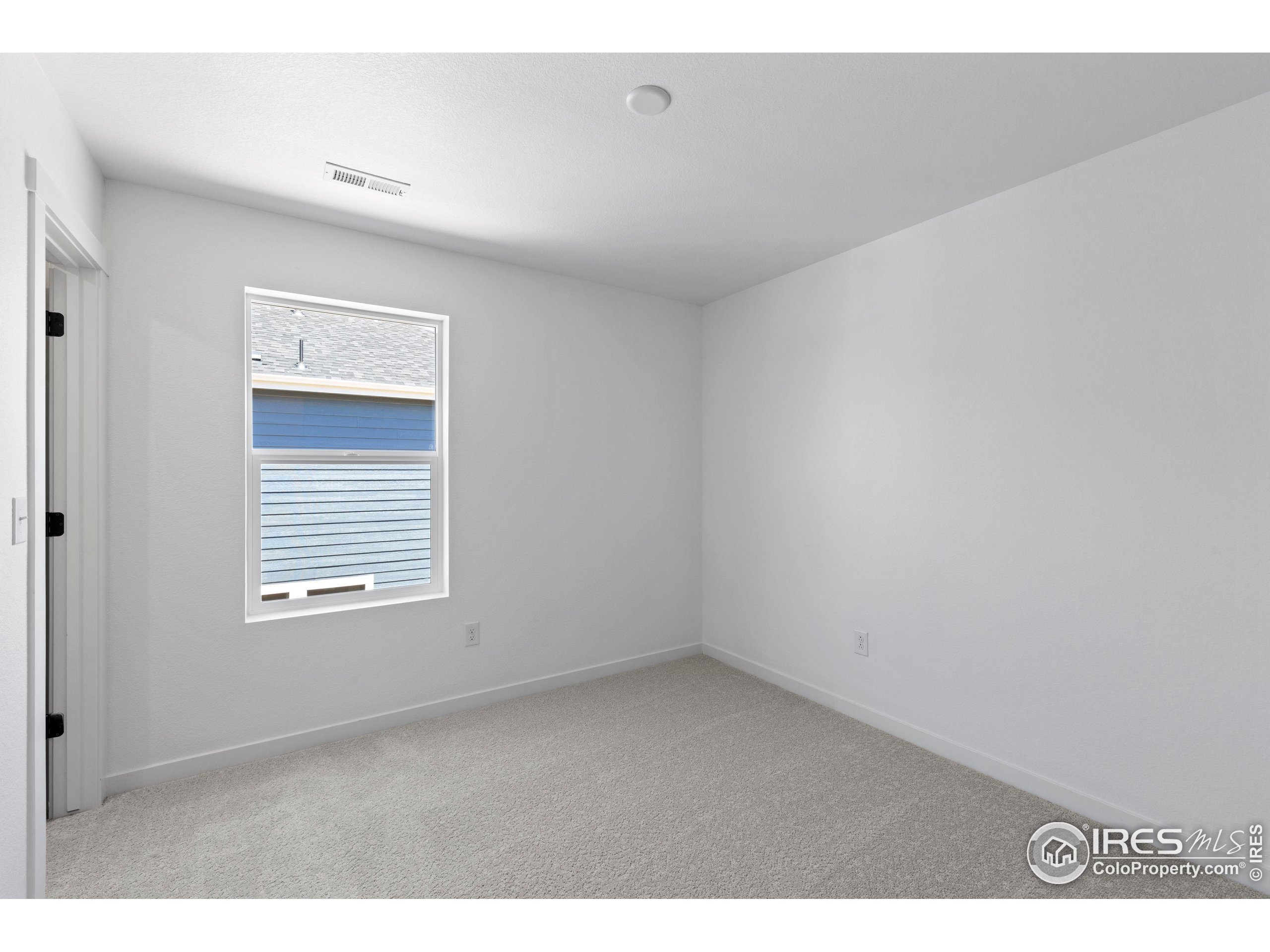 737 Muturu Road Johnstown, CO 80534 - Photo 24 of 26 a view of an empty room with a window