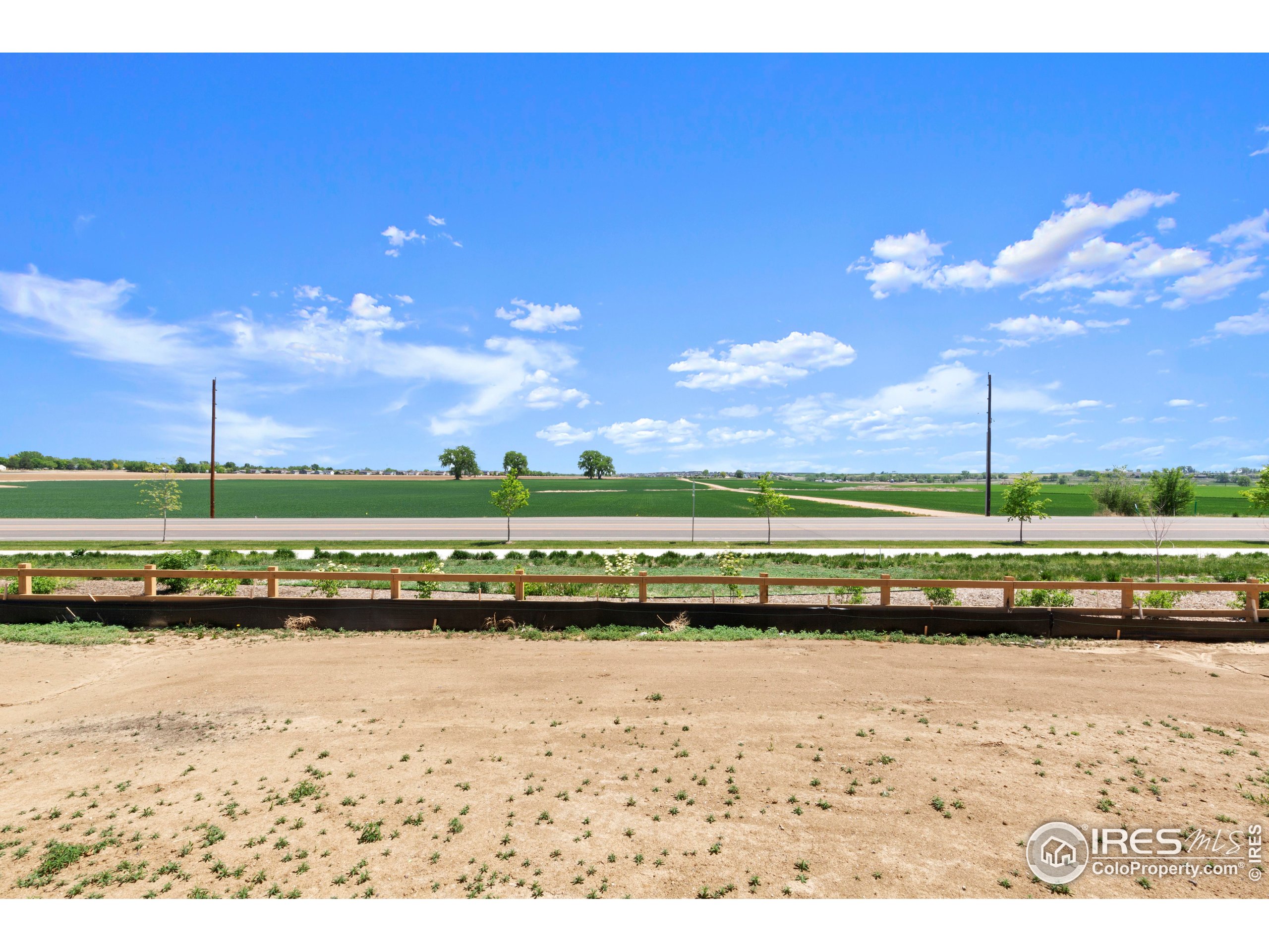737 Muturu Road Johnstown, CO 80534 - Photo 6 of 26 a view of a lake with a lake