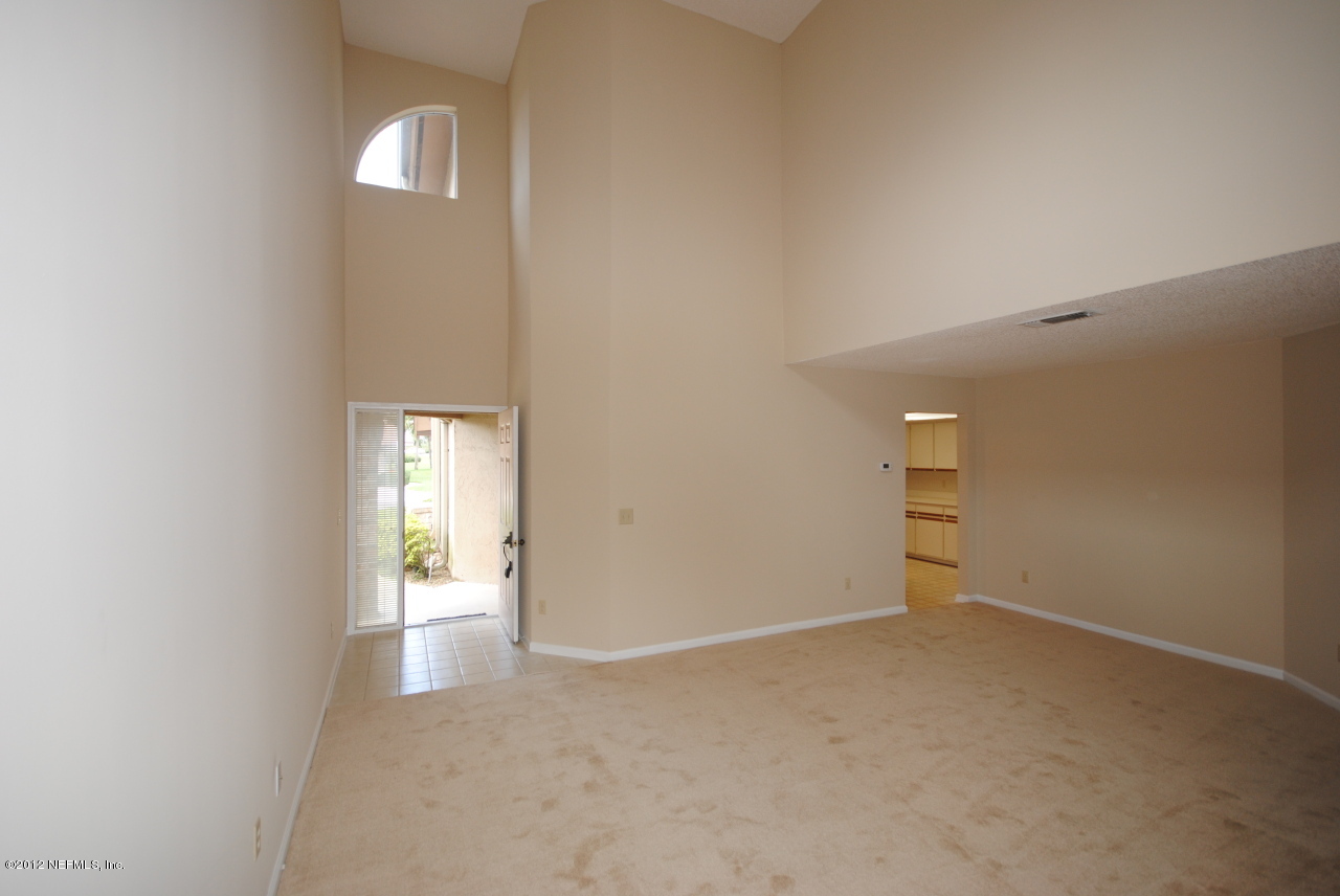 605 Tournament Road Ponte Vedra Beach, FL 32082 - Photo 3 of 10 a view of an empty room and a window